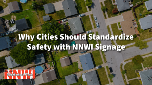 Overhead photo of a neighborhood, white text overlay Why Cities Should Standardize Safety with Official NNWI Neighborhood Watch Signage