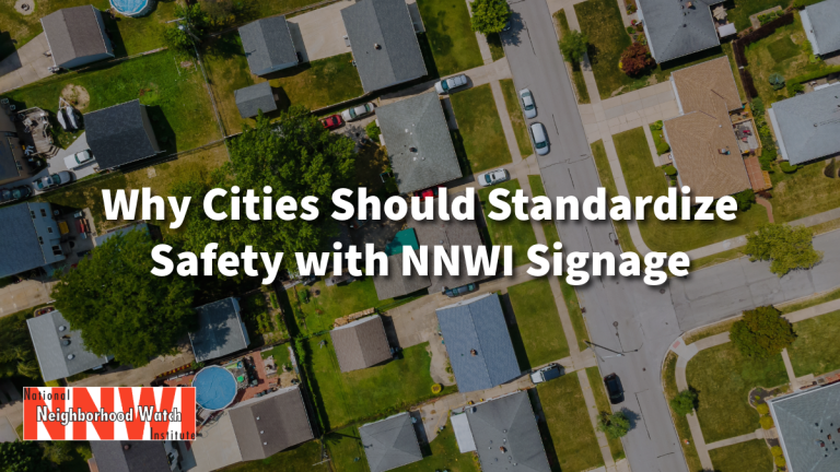 Overhead photo of a neighborhood, white text overlay Why Cities Should Standardize Safety with Official NNWI Neighborhood Watch Signage